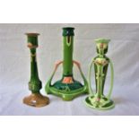 EICHWALD POTTERY CANDLESTICK of cylindrical form with floral decoration to the base and shaped