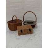 TWO HANDHELD WICKER BASKETS together with a small picnic travel basket