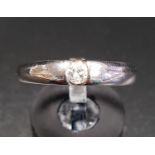 TENSION SET DIAMOND SOLITAIRE RING the round brilliant cut diamond approximately 0.2cts, on nine