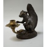 NOVELTY METAL SQUIRREL CHAMBER STICK the squirrel crouched over the stem of the candle stick, with