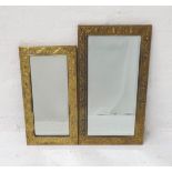 EMBOSSED GILT FRAME WALL MIRROR decorated with thistles around a bevelled plate, 59cm x 33.5cm;