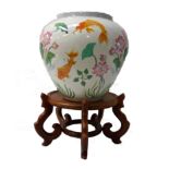 ZHE ZHOU JIANG SHAPED VASE decorated with carp and flowers, the base marked The Vase Of The Garden