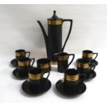 PORTMEIRION POTTERY COFFEE SERVICE designed by Susan Williams-Ellis, the black ground with gilt