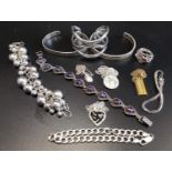 SELECTION OF SILVER JEWELLERY comprising a triple wavy band bangle, two further bangles, a multi