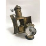 VINTAGE BRASS PREMIER CARBIDE MINERS LAMP together with a brass wall miners lamp.