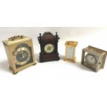 SELECTION OF FOUR CLOCKS comprising of a small mahogany clock with circular enameled dial, two brass