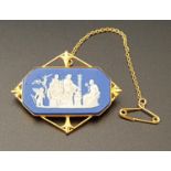 EDWARDIAN WEDGWOOD JASPERWARE BROOCH the octagonal panel with classical scene, in pierced nine carat