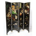CHINESE BLACK LACQUERED FOUR FOLD SCREEN decorated with inlaid mother of pearl and hardstones