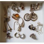 SELECTION OF SILVER EARRINGS including two pairs of amber set stud earrings, a Celtic motif