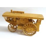 MATCHSTICK MODEL OF A TRACTION ENGINE with a canopy roof, 33cm long
