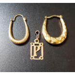 SMALL SELECTION OF NINE CARAT GOLD JEWELLERY comprising two single hoop earrings and a small pendant