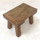 ELM OCCASIONAL TABLE with an oblong top, standing on slanted plain supports, 71cm wide
