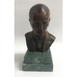 GIORGIO ROSSI bronze bust of Mussolini, signed to the back, on a stepped green marble base, 23.5cm