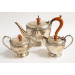 SILVER BACHELOR'S TEA SERVICE circa 1930s, comprising tea pot, sugar basin and milk jug, all with