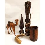 ELM WOOD KITCHEN UTENSIL POT together with a rams horn, a carved wooden camel, a large carved