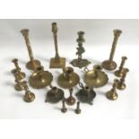 GOOD SELECTION OF MINIATURE AND OTHER BRASS CANDLESTICKS AND CHAMBER STICKS comprising five pairs of