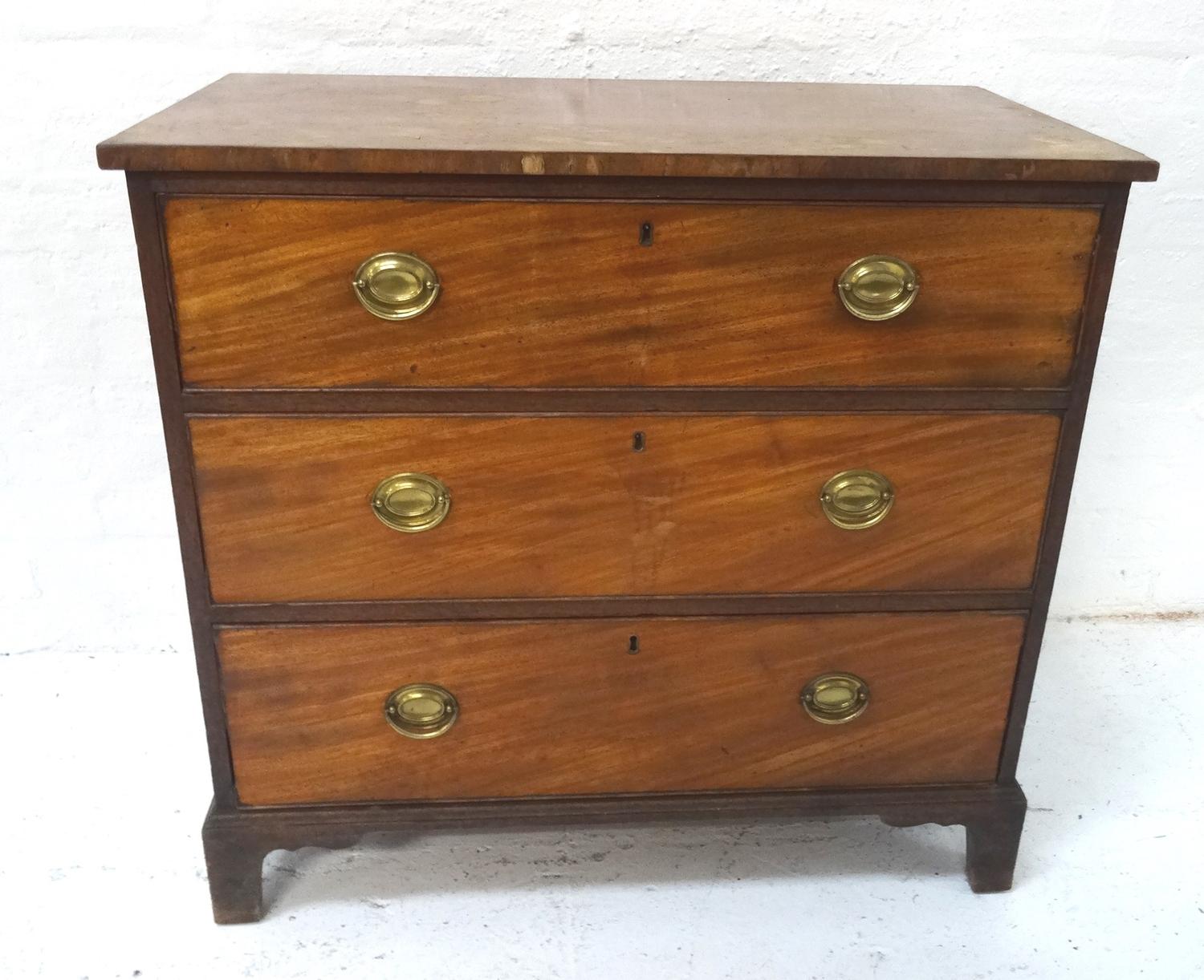 19th CENTURY MAHOGANY CHEST OF DRAWERS with rectangular moulded top above three long graduated and