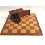 STAINED WOOD CHESS SET together with a matching table top chessboard
