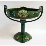LARGE EICHWALD POTTERY COMPORT the oval shaped top with geometric handles and floral decoration,