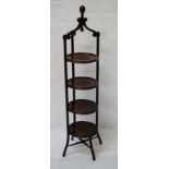 EDWARDIAN MAHOGANY CAKE STAND the four circular tiers with inset linen sections, with three shaped