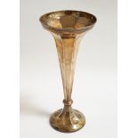 GEORGE V SILVER TRUMPET SHAPED VASE the tapering octagonal body raised on circular foot,