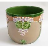 EICHWALD POTTERY JARDINIERE with a green interior and stone exterior, decorated with violet floral