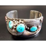 UNUSUAL NAVAJO SILVER BANGLE with wide bangle with applied fern and ball decoration and set with