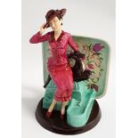 KEVIN FRANCIS LIMITED EDITION FIGURINE of Susie Cooper seated holding her hat, the base marked 104/