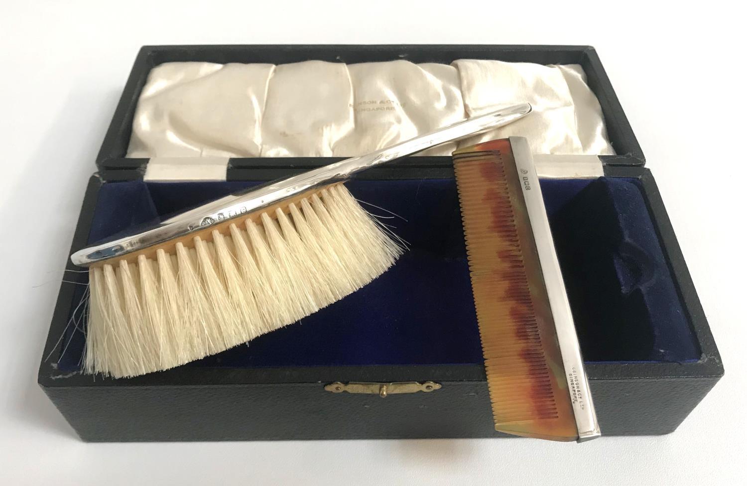 EDWARD VII SILVER BACKED HAIR BRUSH and comb, both stamped Robinson & Co Ltd, Singapore and