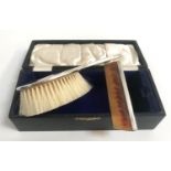 EDWARD VII SILVER BACKED HAIR BRUSH and comb, both stamped Robinson & Co Ltd, Singapore and