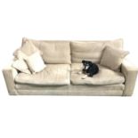 LARGE FOUR SEAT SOFA covered in an oatmeal herringbone material, with loose back and seat cushions