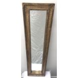 NARROW OBLONG WALL MIRROR with a gilt wood frame, 121cm high