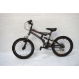 TOPEKA MOUNTAIN RAIDER BICYCLE with dual suspension and twelve gears