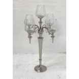 ORNATE CHROME CANDELABRA raised on a circular base and tapering column with four shaped decorative