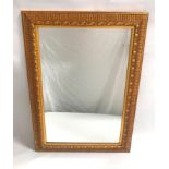 GILT FRAME WALL MIRROR with a beveled oblong plate, 65cm x 91cm