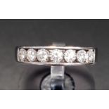 DIAMOND HALF ETERNITY RING the channel illusion set diamonds totalling approximately 0.25cts, in