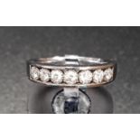 DIAMOND HALF ETERNITY RING the channel illusion set diamonds totalling approximately 0.25cts, in
