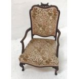 EDWARDIAN MAHOGANY OPEN ARMCHAIR with a shaped carved top rail above a padded back with shaped