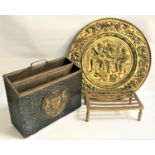 TWO DIVISION MAGAZINE RACK decorated with embossed brass with a central circular coat of arms