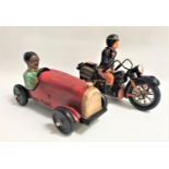 TWO 1950'S STYLE MODELS depicting a man in an open top racing car, 31cm long and a man on an