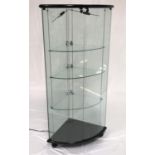 CORNER DISPLAY CABINET with two shaped bowed locking glass doors and glass sides, with adjustable