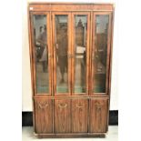 DREXEL PECAN/WALNUT ILLUMINATED DISPLAY CABINET with a plain frieze with brass corners above four