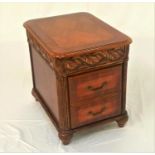 CHERRY FILING CABINET with a rectangular crossbanded and inlaid top above a decorative carved