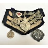 SELECTION OF BOYS BRIGADE BADGES including a cloth sergeants armband, the Dalkeith badge, Boys