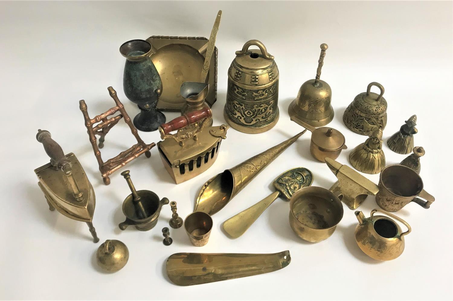 LARGE SELECTION OF BRASS WARE including various hand bells, Welsh love spoons, shoe horn, quaich,