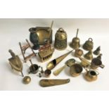 LARGE SELECTION OF BRASS WARE including various hand bells, Welsh love spoons, shoe horn, quaich,