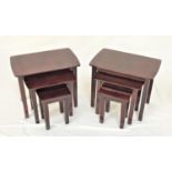 TWO NEST OF STAINED TEAK OCCASIONAL TABLES with oblong tops, standing on plain supports, 55cm wide