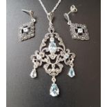 SUITE OF AQUAMARINE AND MARCASITE JEWELLERY comprising a pendant and matching earrings, all in