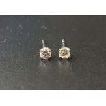PAIR OF DIAMOND STUD EARRINGS the round brilliant cut diamonds totaling approximately 0.18cts, in