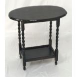 STAINED OAK OCCASIONAL TABLE with an oval top on barley twist supports united by an undertier, 66.